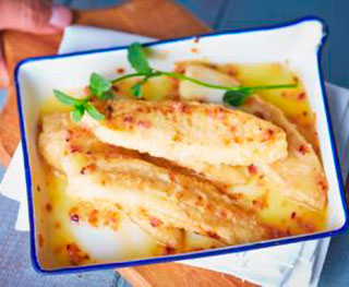 pescado en salsa de naranja knorr caldo de res filetes de pescado jugo de naranja cebolla morada ajo aceite